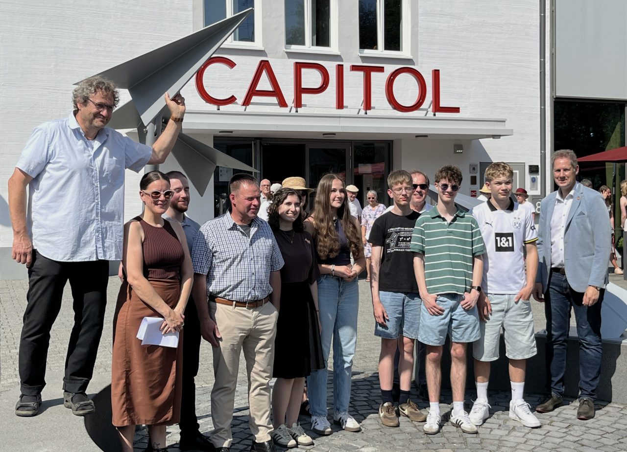 Paper Airplanes in Front of the Neues CAPITOL
